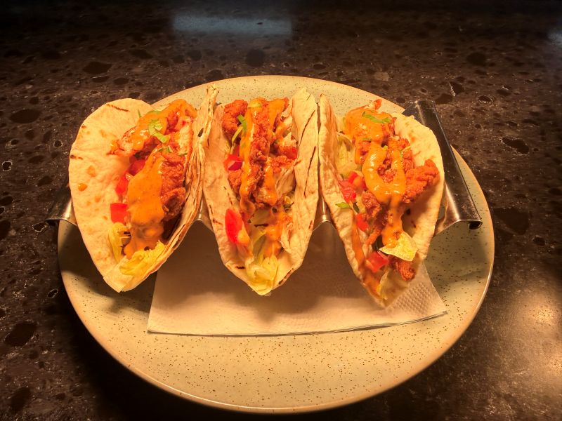 Crispy chicken soft tacos with fresh toppings